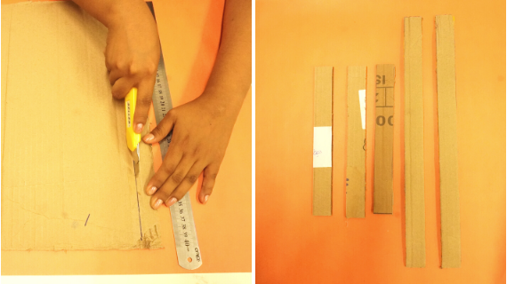 Foto de pedaços de papelão, régua e estilete