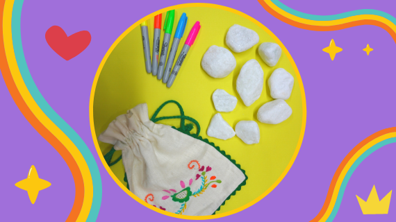 Imagem com pedras, canetas coloirdas e um saquinho